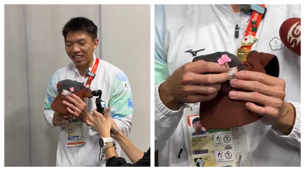 亞運(影)/志工奶奶贈小花好暖心!林仲威把祝福戴在帽上400跨欄奪銅牌(新聞配圖)