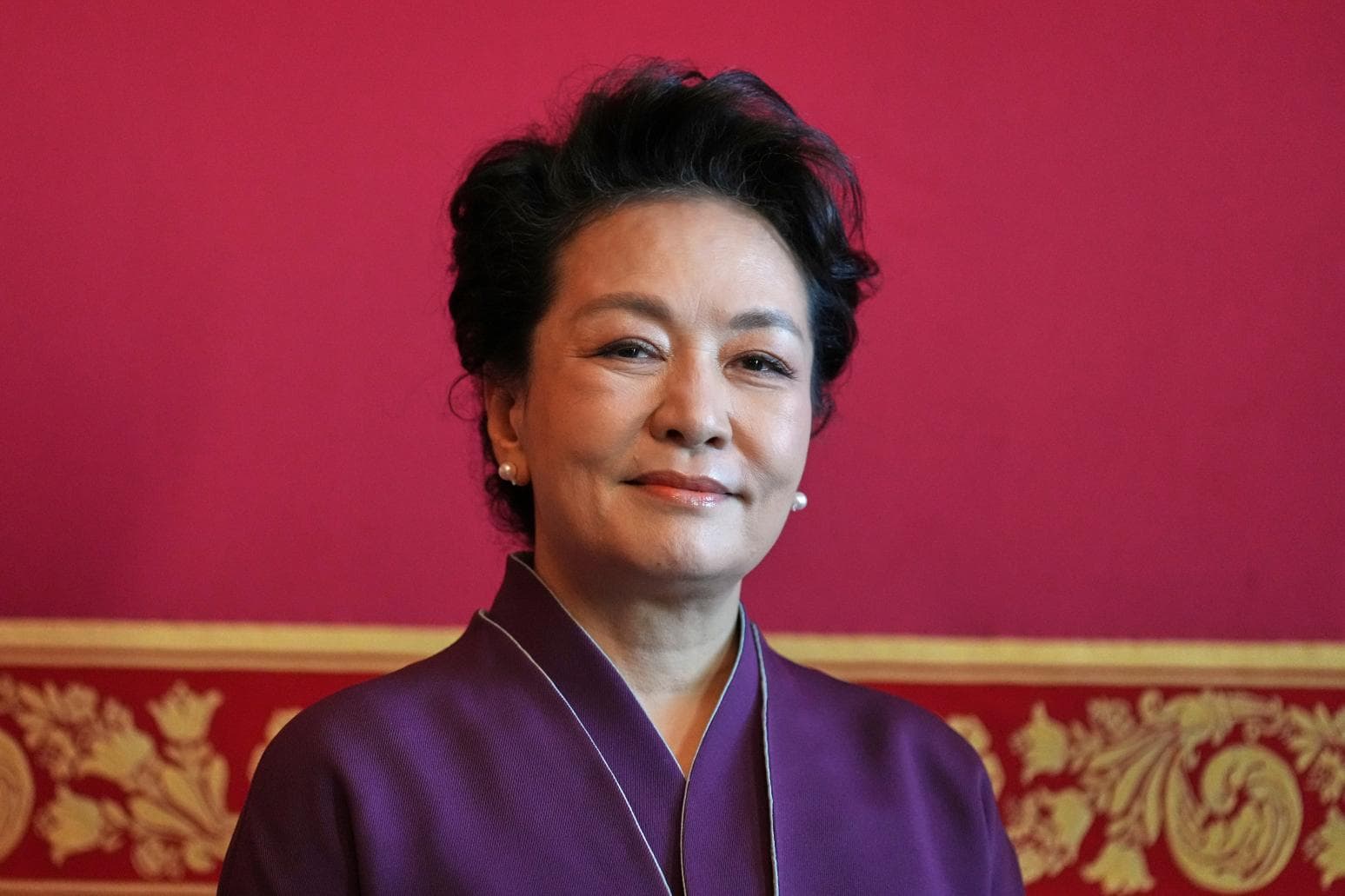 習近平訪美緊牽彭麗媛!WSJ:她角色重要、深具影響力(新聞配圖)
