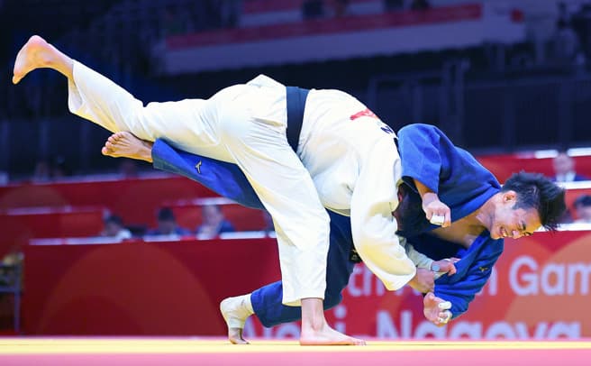 亞運》12分49秒惡戰落敗 楊勇緯掉淚:我的寢技無法發揮(新聞配圖)